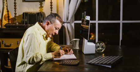 Man discovering eight reasons to use accounting software
